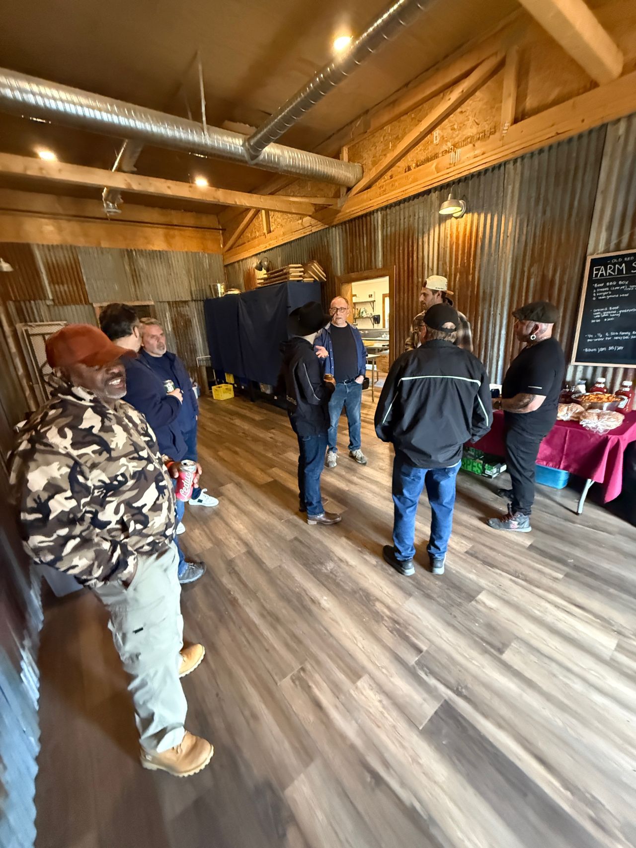 Conversation inside an Alberta barn